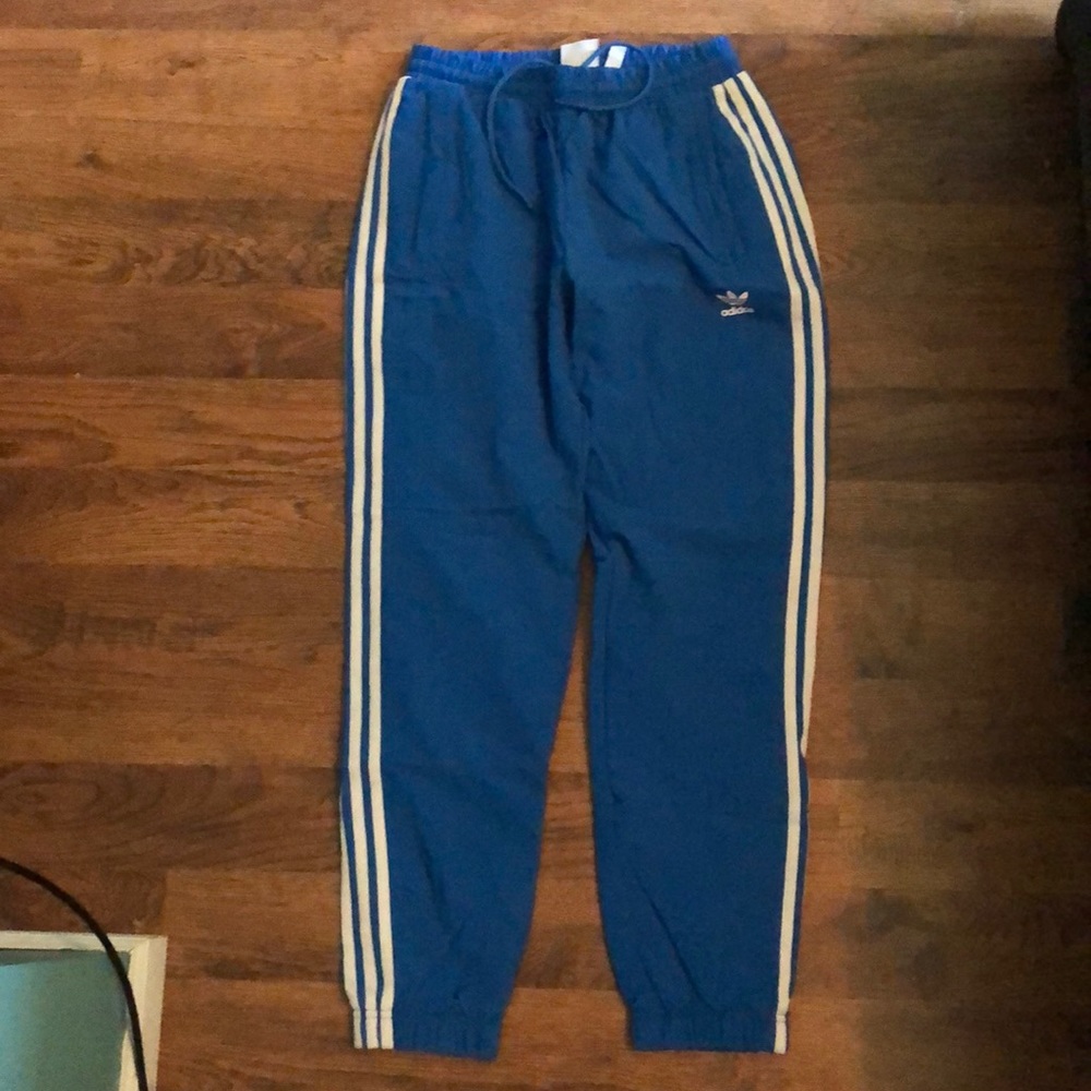 blue adidas tracksuit pants. never worn